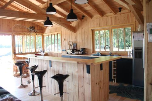 Maison bois Lesbats in Mezos ciems