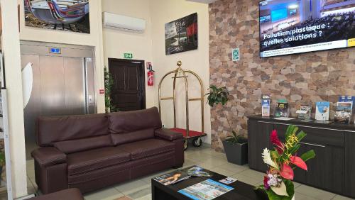 صالة مشتركة/ منطقة التلفزيون, Central Hotel Cayenne in كاين