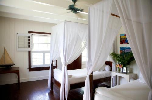 Hibiscus Hill Guest House - Elegant Garden Oasis, Pink Sand Bch home in Dunmore Town