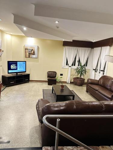 gedeelde lounge/tv-ruimte, Hotel Esmeralda in Piriapolis