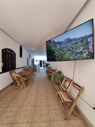 gedeelde lounge/tv-ruimte, Pousada Velha Tartaruga in Praia dos Anjos
