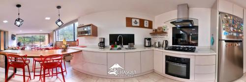 Konyha, El Chasqui Guest House in Tanicuchi