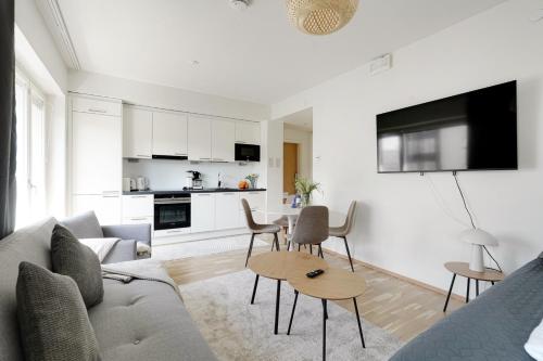 Shared lounge/TV area, Modern condo in Mall of Tripla in Pasila