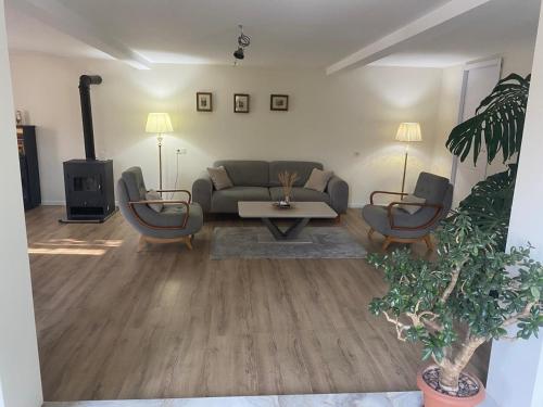 Koplietošanas atpūtas telpa ar TV, Guest House Chalistavi in Tsageri