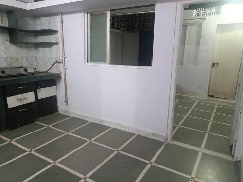 Konyha,  négyzetméteres, 1 hálószobás  1 fürdőszobával Chowk Bazar területén (Home Stay) in Surat