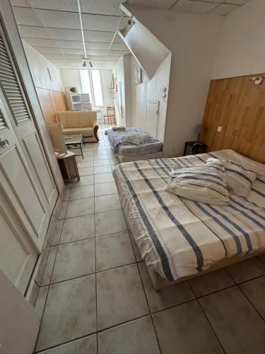 . Appartement charmant à Néris-les-Bains - 30 m² - Jardin privé