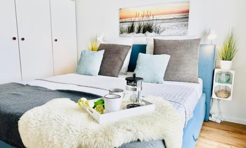 Surfbude, Olpenitz - moderne Ferienwohnung in direkter Strandnähe mit eigenem Eingang, Sauna, Kaminofen, Balkonterrasse und Parkplatz in Olpenitz, Deutschland