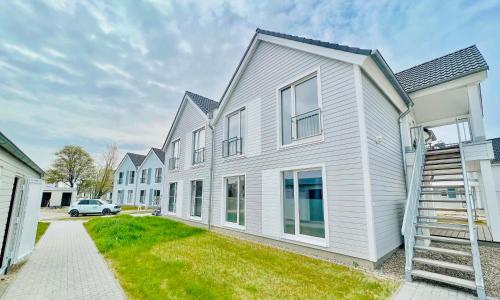 Exterior view, Surfbude, Olpenitz - moderne Ferienwohnung in direkter Strandnahe mit eigenem Eingang, Sauna, Kamino in Olpenitz