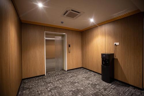 HOTEL 101 PERMAS JAYA NEW near Woody Family Cafe