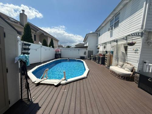 Piscina, Staten Island Cozy Private 1-br Basement Apt close to NYC Family & Pet Friendly in Staten Island