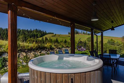 Maciejowe Wzgórze Domek z dwoma niezależnymi apartamentami ze SPA - Sauna, Jacuzzi, Tężnia, Izba Solna i Solankowa, Balia na wyłączność z hydromasażami
