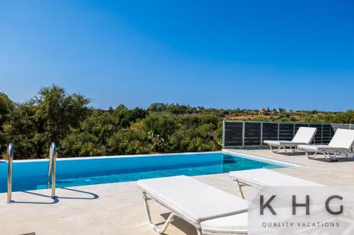 Leo's Red stone & White stone made villas, 2 villas with private pool in Karavados village 3