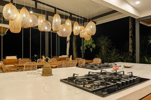 virtuve, Pandanus Lodge & Retreats Bungalow Gingiber in Muelle San Carlos