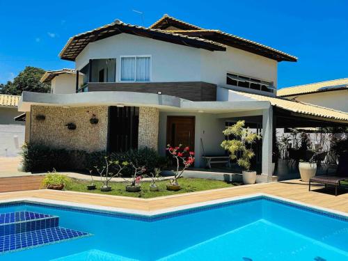 Casa 5 suites a 3 minuntos andando para o mar