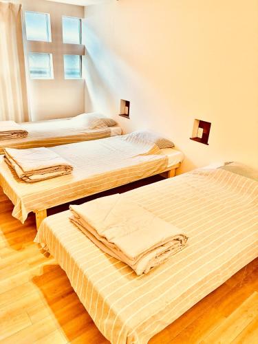 波止場の海まで徒歩30秒の貸切宿 "ギョグンミニ" "Gyogun Mini"