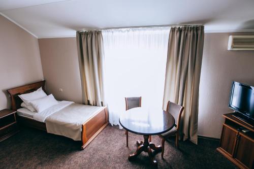 Bridge Hotel Pomestiye Hotel is conveniently located in the popular Krasnodar area. Offering a variety of facilities and services, the hotel provides all you need for a good nights sleep. 24-hour front desk, room