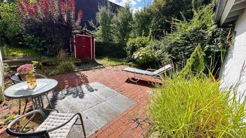 สวน, Ferienwohnung mit Garten am Wald in บาร์ซิงเฮาเซิน