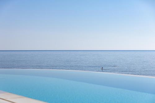 In Blue Villa Sea View Reverie with a Secluded Beach by etouri - image 5