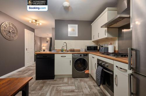 Kitchen, 4 Bedroom House By Homebird Property Management Short Lets & Serviced Accommodation Leeds with Parki in Far Royds