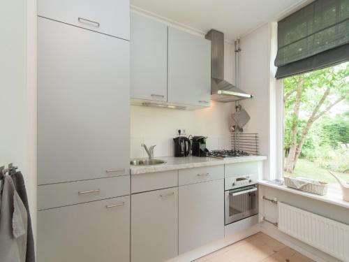 Kitchen, Peaceful Dune Retreat with Garden in Schoorl met Bregtdorp