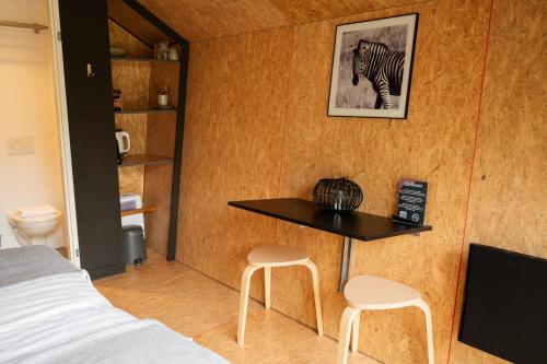 Tenthuisje in het groen, een suite met eigen badkamer, Callantsoog (Foto 5)