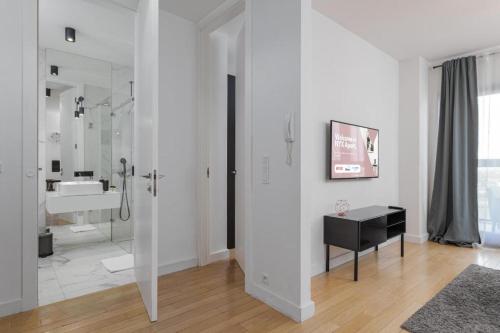 13th Floor Arkadia Apartment by NYX Apart