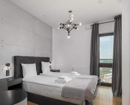 13th Floor Arkadia Apartment by NYX Apart
