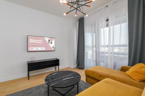 13th Floor Arkadia Apartment by NYX Apart