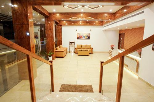 Hotel Praada Residency in โกทามังคาลาม