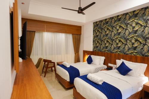 Hotel Praada Residency in โกทามังคาลาม