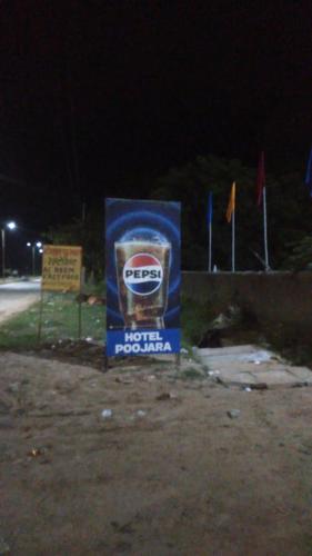 Pujara Hotel in Malpura