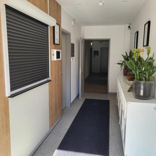 Bejárat, Bader Aparthotel in Unterschleissheim