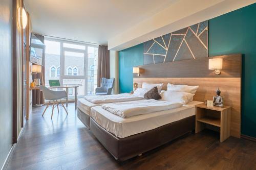 eXo Boutique Hotel Mannheim - by SuperFly Hotels - Tap to explore photos
