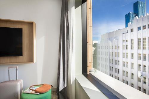 墨爾本伯克街購物中心假日酒店 - 洲際酒店集團旗下 (Holiday Inn Melbourne Bourke Street Mall By IHG) in 墨爾本