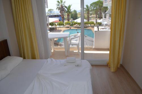 Mulka Hotel Set in a prime location of Ayvalik, Mulka Hotel puts everything the city has to offer just outside your doorstep. Offering a variety of facilities and services, the property provides all you need for 