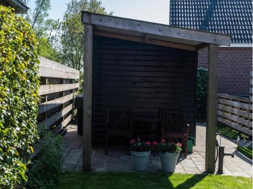 Garden, Atmospheric Wadden houses located next to each other near the Wadden Sea in Paesens