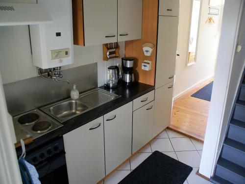 Kitchen, Atmospheric Wadden houses located next to each other near the Wadden Sea in Paesens