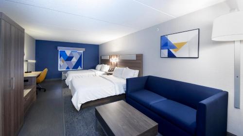 Queen Suite with Two Queen Beds and Sofa Bed