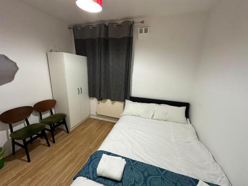 Comfortable Budget Room With Shared Bathroom, City Access, Near Tube & Bus, Steps from London Eye, Londra