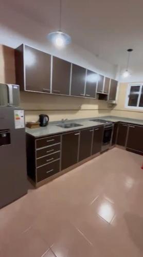 Kitchen, Vista parque Saavedra - u2 - 2 camas 2 personas planta baja a mts del parque Eventos River Tecnopoli in Coghalan