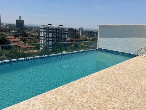 Zwembad, Cozy Stylish Apartment with King Bed and Wi-Fi in Athi River