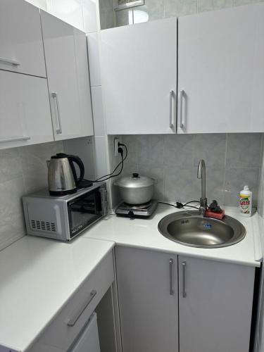 2 комнатная квартира 1 мкр 21 дом, Türkistan (foto 5)