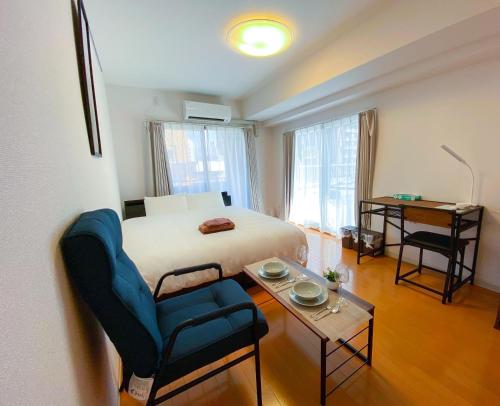 Walk to JR Shinjuku - Grand Écru II 605 - Balcony & Kitchen