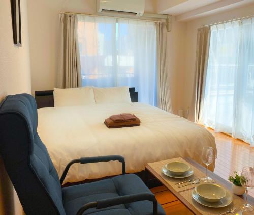 Walk to JR Shinjuku - Grand Écru II 605 - Balcony & Kitchen