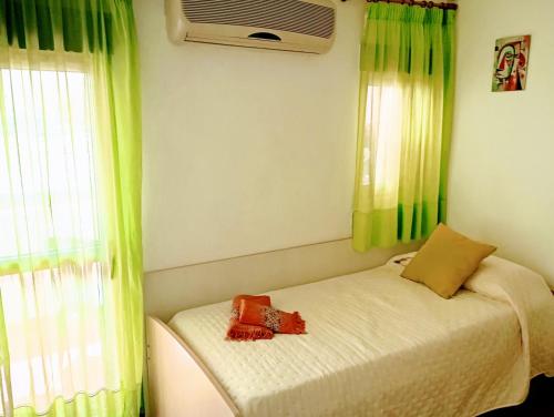 Chambre simple avec terrasse à 150m de la plage