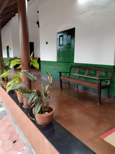 Vintage Brown by Ophel Homes in Mananthavady