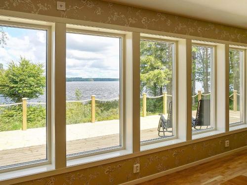 Lakefront House with Terrace in Hyltebruk