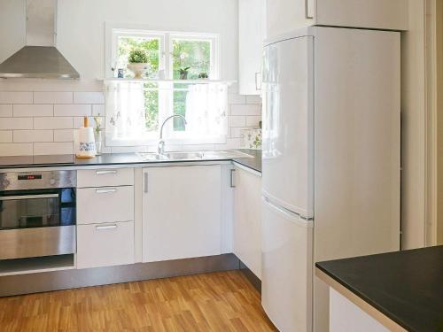 Lakefront House with Terrace in Hyltebruk