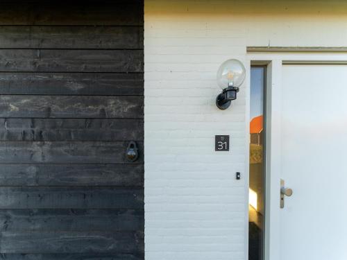 Lobby, Detached villa with view, garden and privacy in Tholen