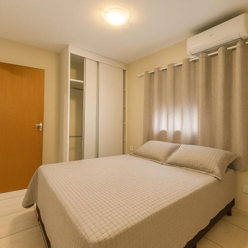Apartmento com Garagem, Ar Condicionado próximo Madrecor, UFU, Parque Sabia